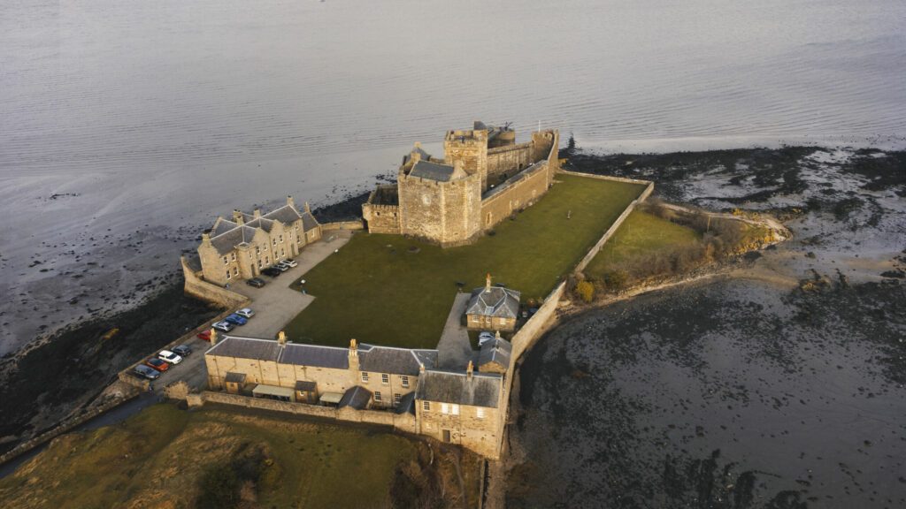 Aerial shot of the Blackness Castle in Scotland