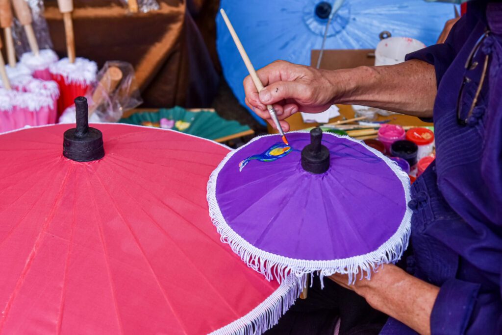 Painting on Handmade umbrella of the village Bo Sang, Chiang mai, Thailand.