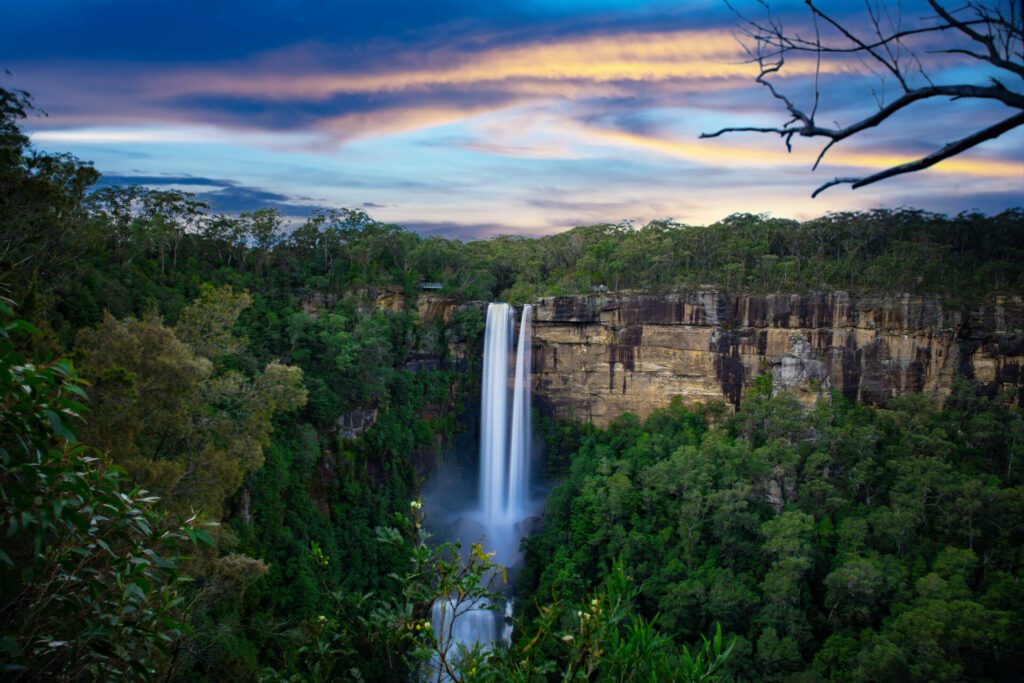 Flowing River in Fitzroy water Falls in Bowral NSW Australia beautiful colourful cloudy skies lovely waterfalls