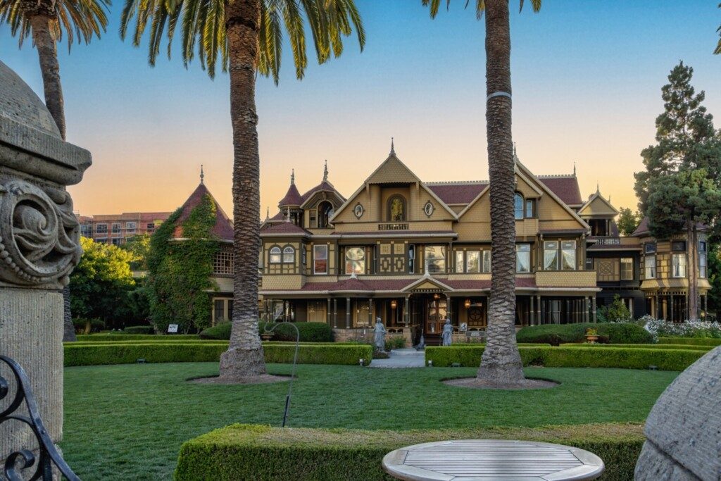 Beautiful view of the Winchester Mystery House Museum during a summer sunset.